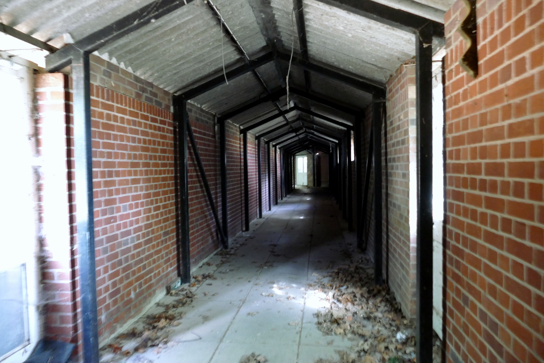 Interior of creepy brick corridor in Sergeants' Mess