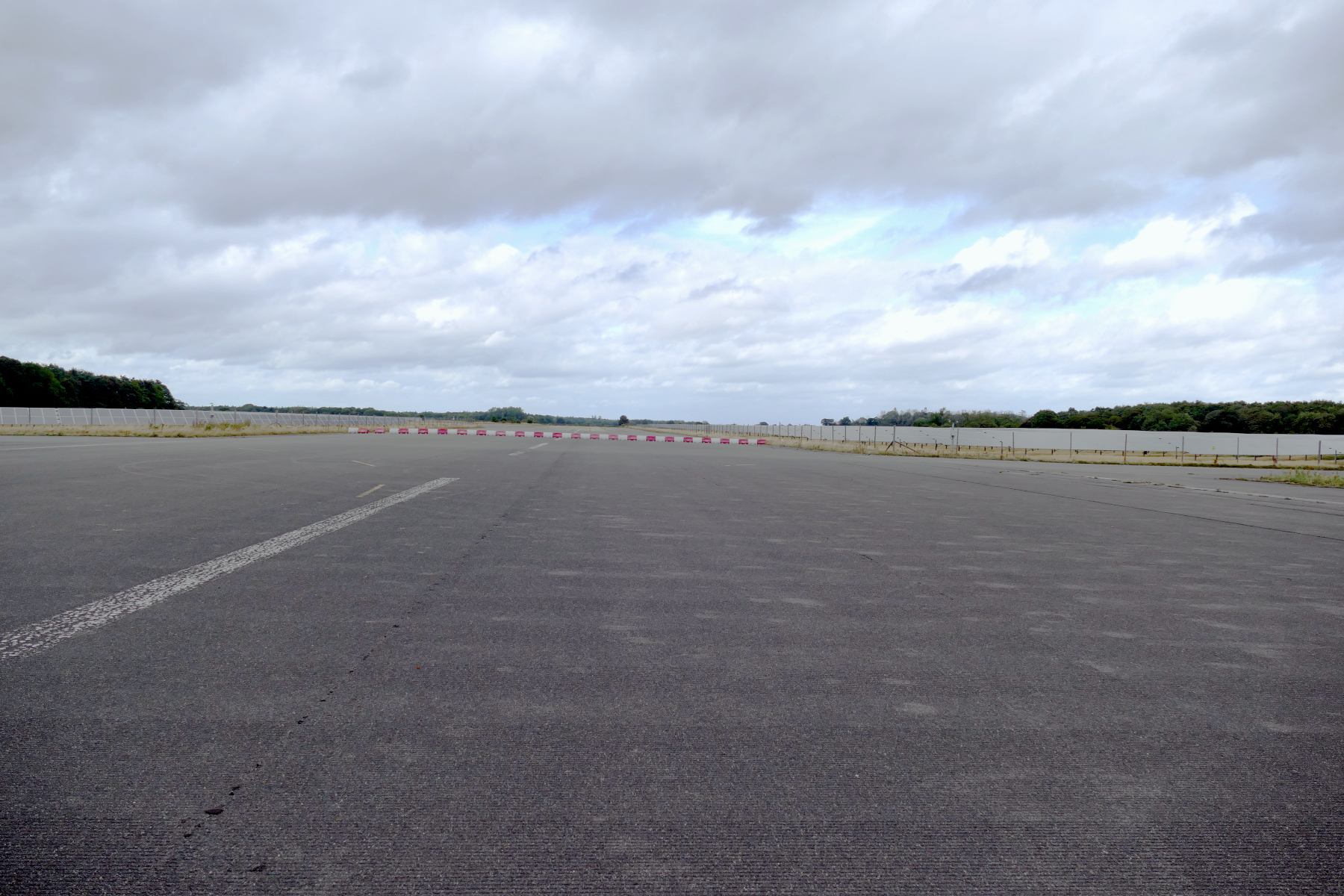 Wide shot of old RAF aircraft concrete runway